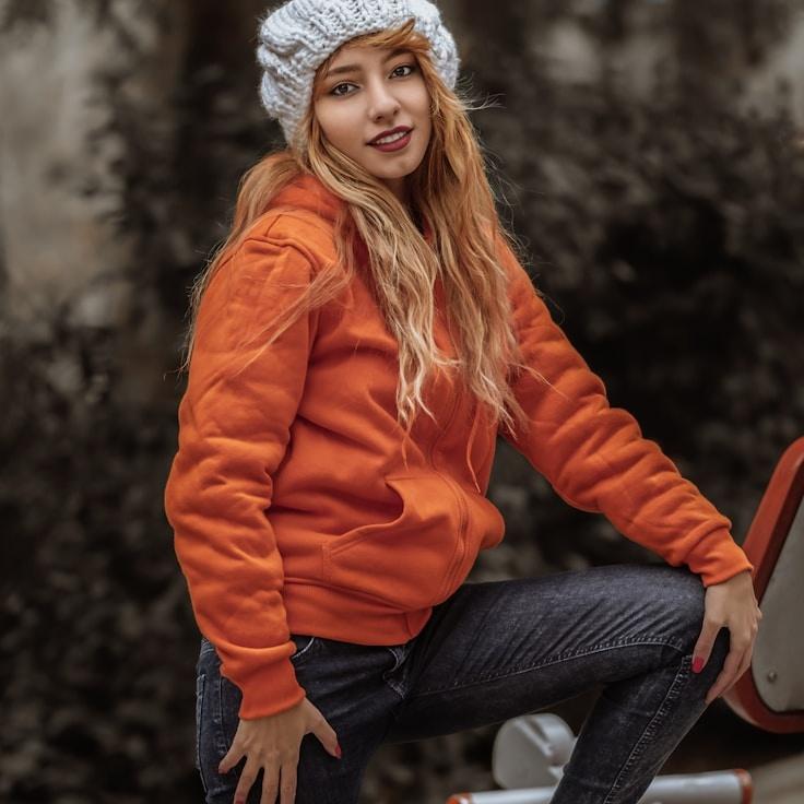 Amina Rao, Lead Design Curator at CalmForwardDirection, reviewing corporate floral arrangements